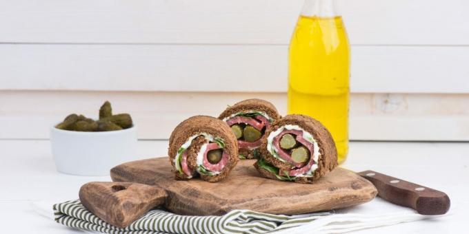 Brown bread roll with sausage
