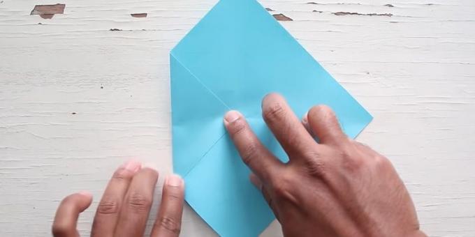 Envelope with your hands: Fold the left corner