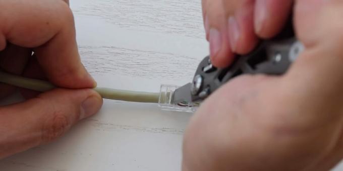 How to crimp a twisted pair cable: Secure the connector