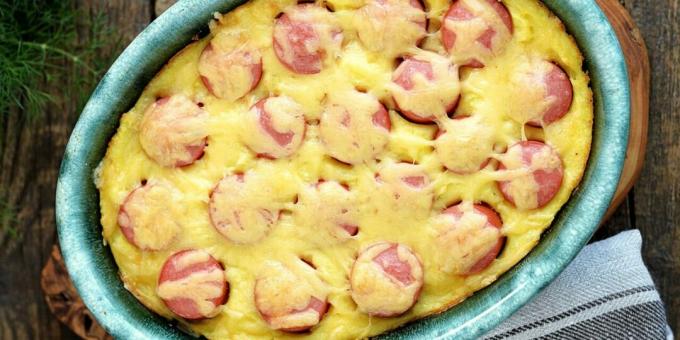 Mashed potatoes with sausages in the oven