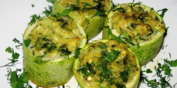 Baked zucchini stuffed with herbs and cheese
