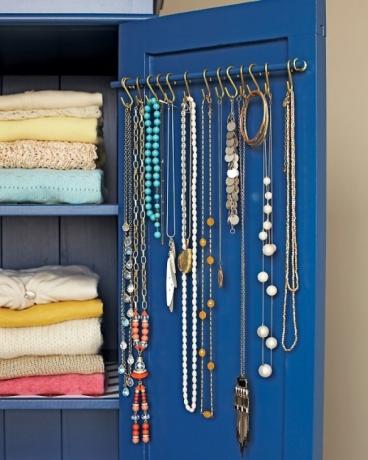 Storage of jewelry on hooks in the closet