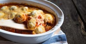 Italian dumplings casserole with tomatoes, garlic and cheese