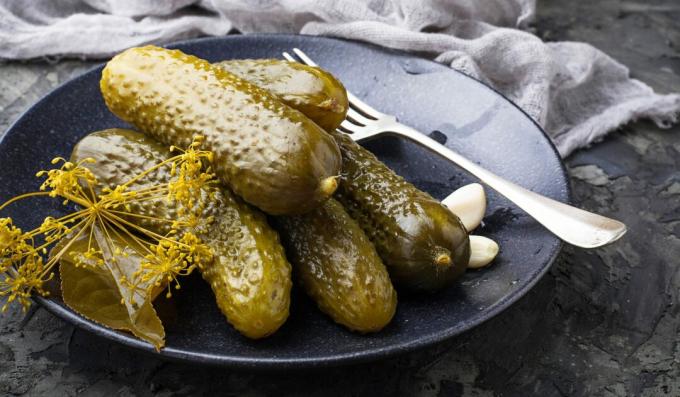 Pickled cucumbers with herbs for the winter