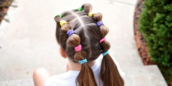 Hairstyles for girls: low ponytails with rubber bands