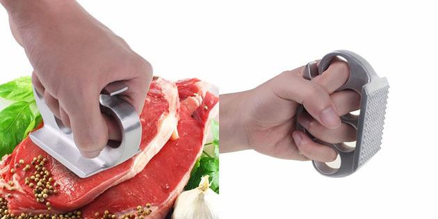 Meat tenderizer in the form of brass knuckles