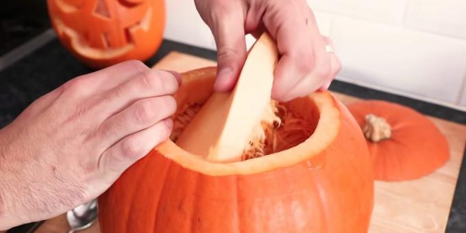 How to cut a pumpkin for Halloween with your hands: take out the pulp
