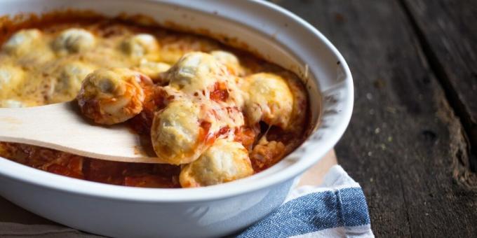 Italian dumplings casserole with tomatoes, garlic and cheese