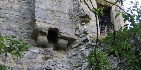 toilet story: arranged in closets in a large castle restrooms