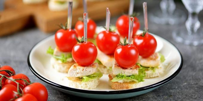 Canape with chicken and cherry