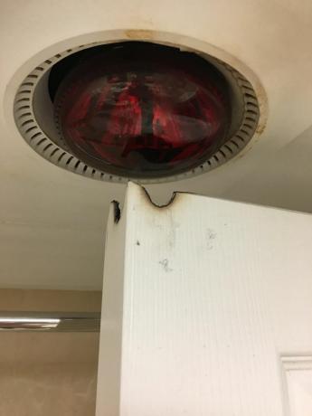 dangerous lamp in the bathroom