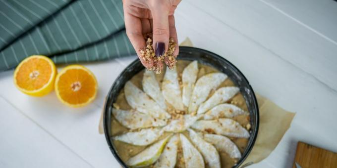 Spread on top of pears and sprinkle with nuts