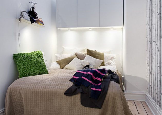 Narrow bedroom: storage space above the bed