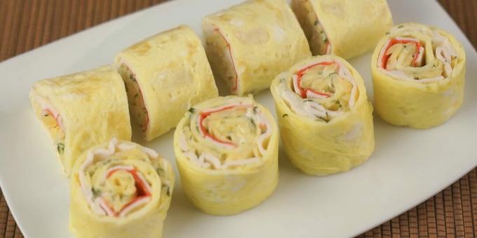 A simple recipe for egg pancake rolls with crab sticks and cheese