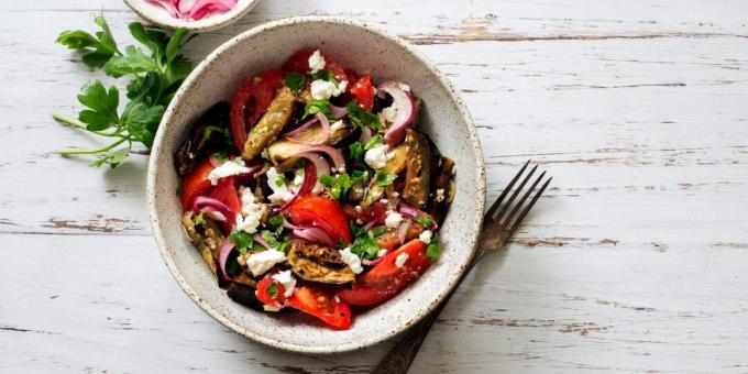 Warm salad with eggplant, tomatoes and cheese