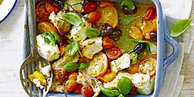 Salad with tomatoes. Warm salad with tomatoes, olives and feta