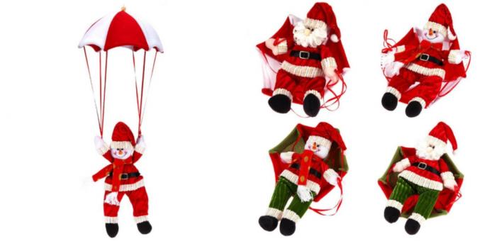 Santa Claus and a snowman on a parachute