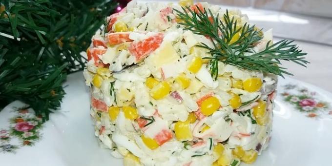 Salad with crab sticks, rice, corn, eggs and cheese