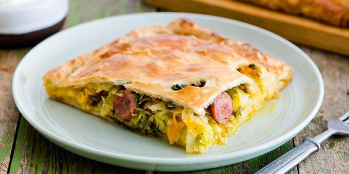 Puff pie with cabbage and sausages