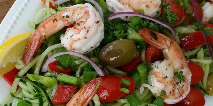 Salad with cucumbers, shrimps and olives