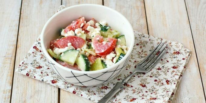 Salad with cottage cheese, cucumber and tomato