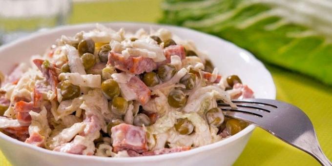 Fast and delicious food: salad with smoked sausage