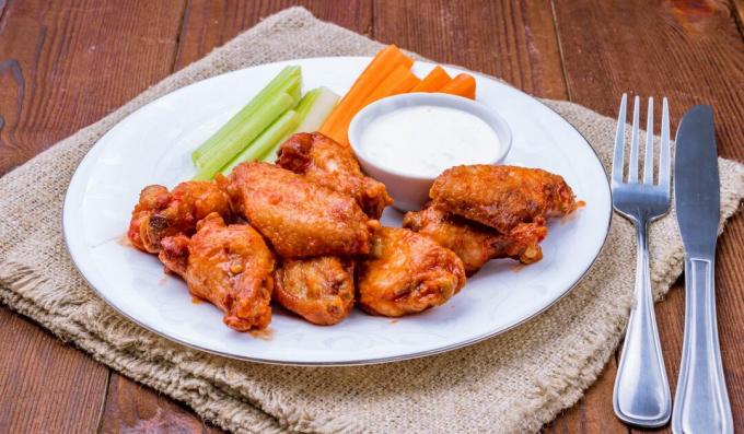 Buffalo chicken wings with tomato paste and tabasco sauce