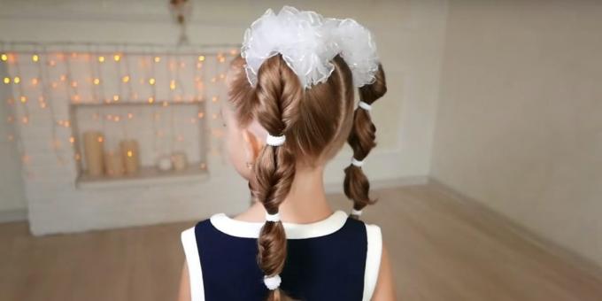 Hairstyles September 1: high twisted tails with rubber bands