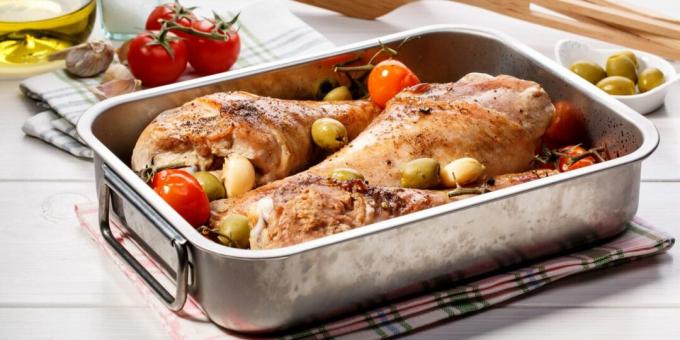 Turkey drumsticks baked with tomatoes and olives