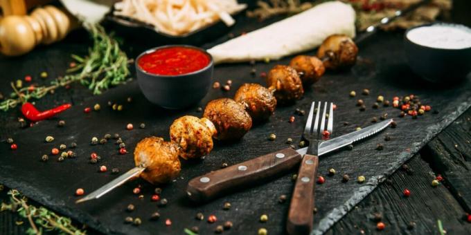 Champignons with sour cream on the grill