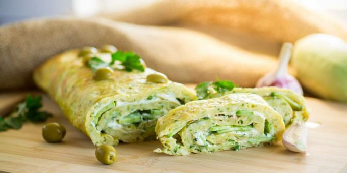 Zucchini roll with olives and cucumbers