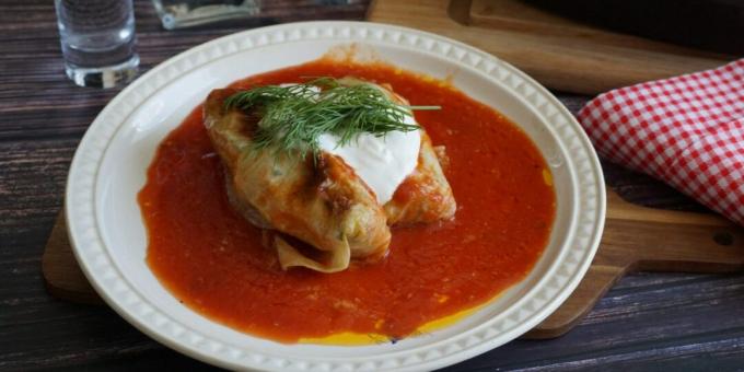 Stuffed cabbage rolls in tomato-wine sauce