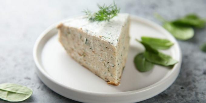 Pancake cake with curd cheese and herbs