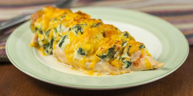 Chicken fillet with cheese and spinach in the oven