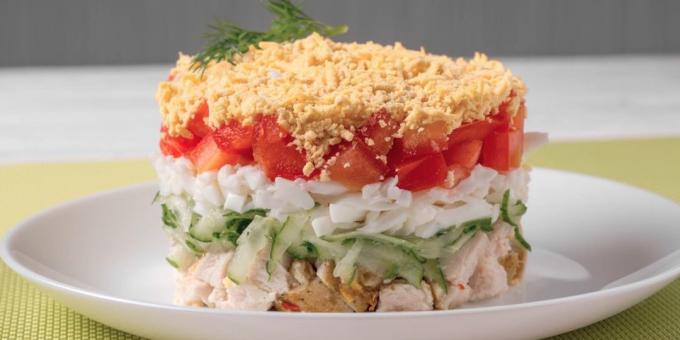 Puff salad of cucumbers, tomatoes, chicken and eggs