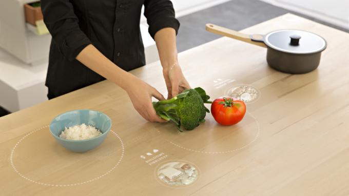 The kitchen of the future: universal table for cooking