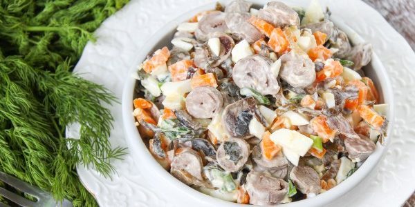 Marine cabbage salad with chicken hearts and carrots