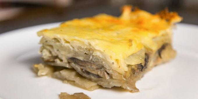 Casserole with potatoes and mushrooms with cheese