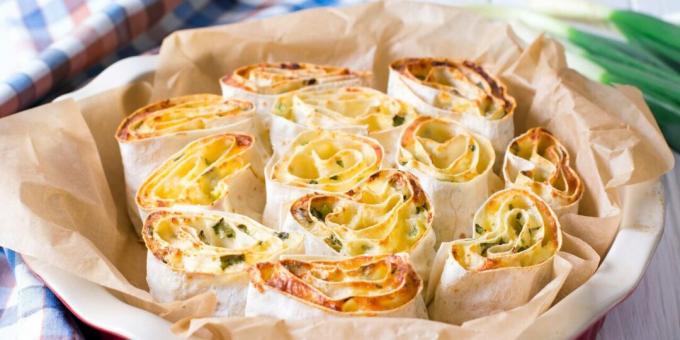 Hot lavash rolls with cheese and ham