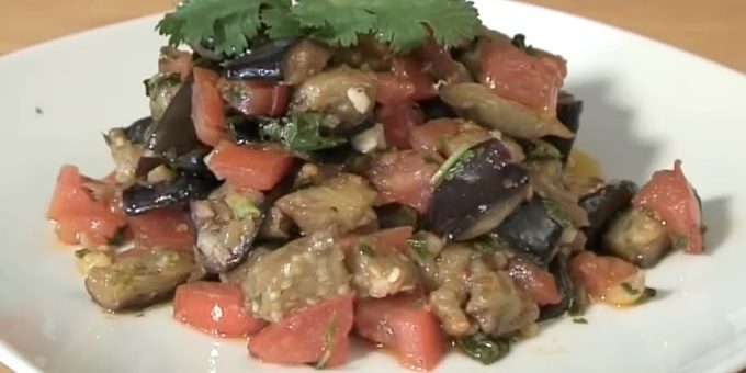Warm salad with eggplant and tomatoes
