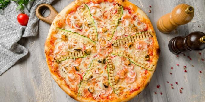 Pizza with seafood and zucchini