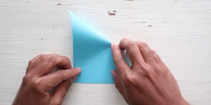 envelope with your hands: bend the paper in the opposite direction 