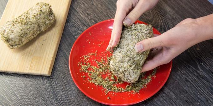 Remove the parchment and foil roll and sausage with herbs