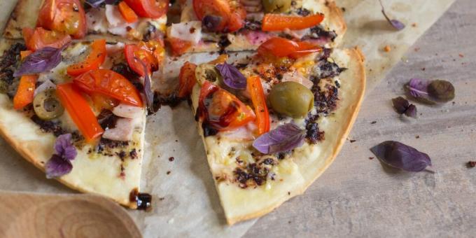 Tortilla pizza with ham, cherry and pepper
