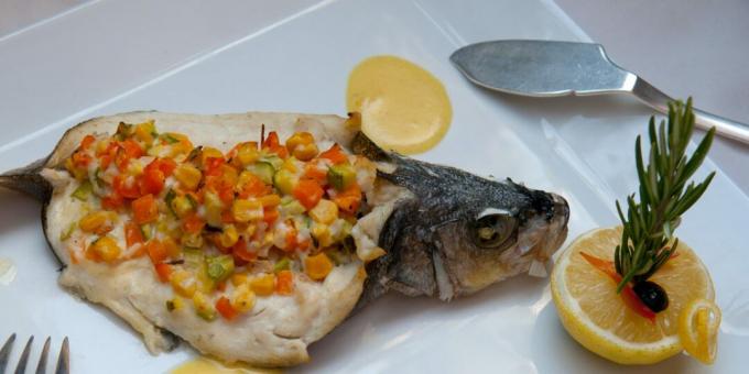 Seabass baked in the oven with corn and pepper