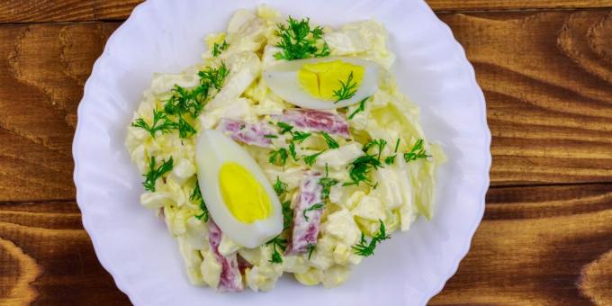 Salad with smoked sausage, eggs and cabbage: a simple recipe