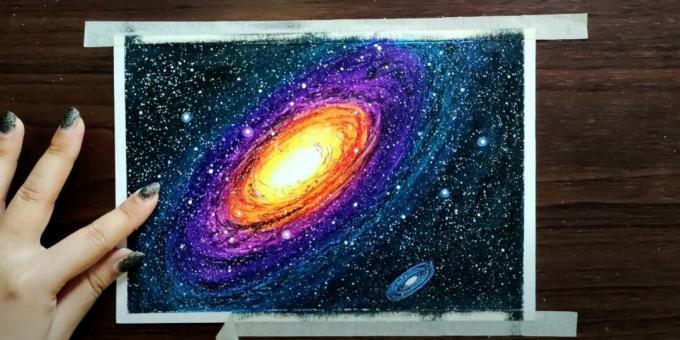 How to draw space with pastels: depict an oval and circles