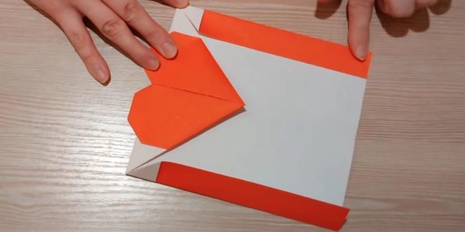 Turn the paper over and fold the side edges