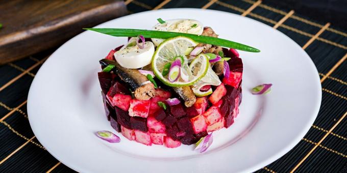 Salad with canned fish, beets and carrots: a simple recipe 