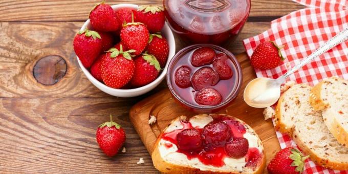 Strawberry jam with whole berries and lemon